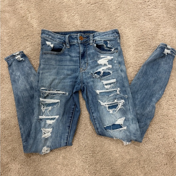 American Eagle Outfitters Denim - American Eagle Outfitters Ripped Blue Skinny Jeans